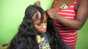 This is a middle part sew in braid pattern that also lets you play with fringe. Tutorial On A Part In The Middle Sew In Youtube