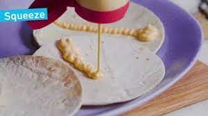 That's just gonna go on top. Peri Peri Fish Finger Tacos