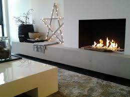 A Built In Ethanol Fireplace With A Stone Shelf That May Be Used As A Seat In 2020 Home Fireplace Ethanol Fireplace Bioethanol Fireplace