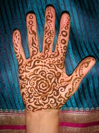 Or the artist can use airbrush tattoo ink for body art painting that can last for a week or more. Mehndi Moon Henna Judy O Designs