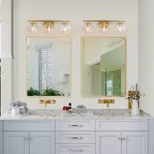 Recommended use of 3 x 60 watt maximum medium base light bulb, not included. New World Decor Pursuit 3 Light Gold Modern Contemporary Vanity Light Lowes Com Bathroom Mirror Lights Bathroom Makeover Gold Bathroom