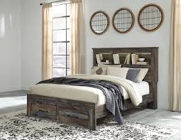 Bookshelves with breathing room are more visually pleasing than an inconsistent, haphazard collection. The Drystan Multi Queen Full Bookcase Headboard Sold At Outten Brothers Of Salisbury Serving Salisbury Maryland And Surrounding Areas