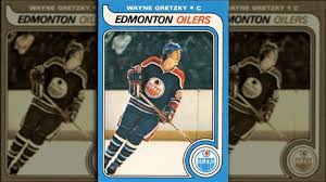 A game played on a sports field between two teams of eleven players who each have a curved stick with which they try to put a small, hard ball into the other team's goal. The Most Expensive Sports Trading Cards Ever Sold