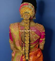 A Burst Of Happy Colours Traditional Southern Indian Bridal Hairstyle By Mua Veje Indian Bridal Hairstyles Indian Bride Hairstyle South Indian Bride Hairstyle