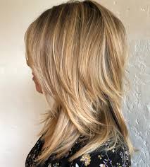 The brown and blonde balayage is enhancing the shape of the feathers. 50 Latest Shag Haircut Variations Trendy In 2021 Hair Adviser