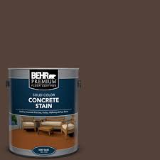 Stained concrete driveway with contrasting color border. Behr Premium 1 Gal Pfc 25 Dark Walnut Solid Color Flat Interior Exterior Concrete Stain 83001 The Home Depot