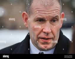 Director of Public Safety Thomas A. Coombs of the Southgate Police  Department talks with media outside of house, the scene of a homicide, in  Southgate Mich.,