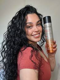 We've cracked the code to balance the benefits of a hairspray that are  curl-friendly, without the crunchy feel! Our NEW Flawless Finish hairspray  offers 24 hours of hold* and humidity protection and