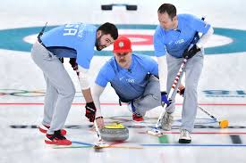 Each player on two teams slides round stones across the ice toward a target called the tee, . Curling Clubs Are Overwhelmed With Interest After The Olympics