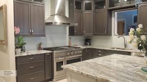 Take a look at the front part of the island with lovely shelves.image source: Gray Cabinets With An Off White Kitchen Island Omega