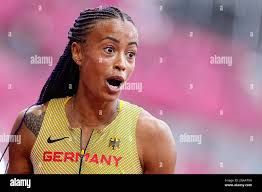 Tokyo, Japan. 30th July, 2021. Anabel Medina Ventura (R) of Dominican and Taylor  Manson of the United States compete during the 4x400m Relay Mixed Heat at  the Tokyo 2020 Olympic Games in