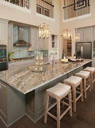 River white granite countertops with white and grey color combinations. Gorgeous Two Story Kitchen Granite Countertops Pendant Lighting Blue Mosaic Backsplash Tile Grey Cab Transitional Kitchen Design Sweet Home Kitchen Remodel