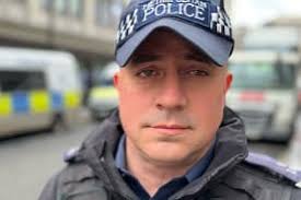 Hero officer receives bravery award for facing down gunman after police  chase