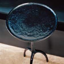 bronze trepied side table by liaigre interior architecture architecture project bronze