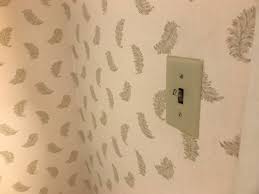old 90 s feather wallpaper in room