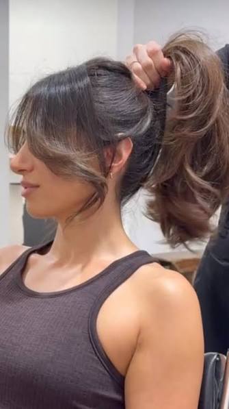 Ponytail With Curtain Bangs Hairstyle