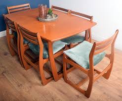 It gives it a rich feeling and looks beautiful when set for holidays. Restored Teak 1960s Portwood Danish Style Table Six Chairs Portwood Vinterior