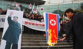 Alles rund um kostüme & verkleiden. Activists Rip North Korean Leader S Photo In Olympic Protest Arab News