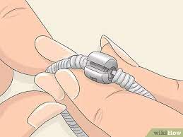 Grasp the clasp on either side of the slit and gently press your thumbnail in the slit until the hinge pops open. Easy Ways To Put Charms On A Pandora Bracelet 10 Steps