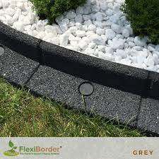 A gravel path edged with timbers or lumber is the perfect solution. 1m Flexiborder Garden Edging In Grey H8cm By Ecoshape 12 99