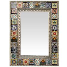 The tile supports the mirror while the adhesive sets. Mexican Tile Mirror Tin Mirror With Tile Frame La Fuente