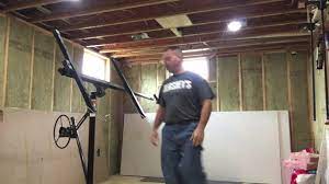 The definition of an unfinished basement is a basement or lowest floor of a house that has not had finishing done on walls, floor and possibly ceiling. Finishing My Basement Hanging Drywall On Ceiling Youtube
