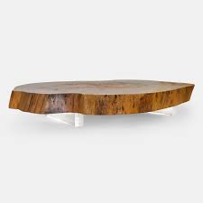 The natural wood grain will vary and make every table unique. Vinhatico Crosscut Wood Coffee Table Rotsen Furniture