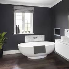 Designer suzann kletzian transformed a dark chicago bathroom into a luxurious escape thanks to even though the room is mostly white, the black and grey veins in the marble give the space depth. Makeover Glamorous Grey Bathroom Ideal Home Gray Bathroom Walls Dark Gray Bathroom Grey Bathrooms