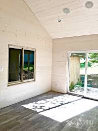 For interior walls, shiplap was the standard base behind a classic wallpaper install before drywall these wider whitewash barnwood beauties instantly brighten any space and are available now on. Cottage Update Shiplap Walls Porcelain Tile And More