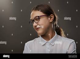 Coy look hi-res stock photography and images