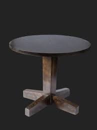L brown round wood coffee table with sink top. Table Bases A L Furnishings Ltd