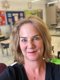 Mrs. Higgins bids farewell to her former lower school students