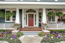 front porch columns craftsman with arch arts and crafts house design white wall planter