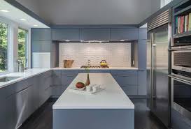 Mid Century Modern Remodel In Massachusetts Opens To The Outdoors Modern Kitchen Design Kitchen Backsplash Trends Modern Kitchen Tiles
