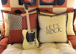 Music room decor ideas mount guitars on the wall. 33 Diverse Music Themed Bedroom Ideas To Sing About Lovetoknow