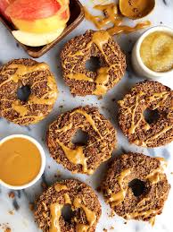 You add all the ingredients, the cider, whiskey, and spices, to a sauce pan and you simmer it for about 10 minutes. Baked Paleo Apple Cider Donuts Recipe Vegan Rachlmansfield