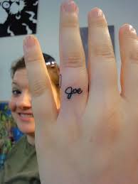 Often seen as a very christian religious symbol this cross design finger tattoo implies that you are a religious person of god and faith. Name Tattoos On Ring Finger Novocom Top