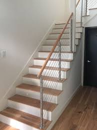 Wagner provides cable railing with a sleek design and optimal durability that is flexible and able to be installed in numerous applications, indoors and out. Our Stainlesssteel Wire Rope Railing With Wood Rail Makes A Modern Statement All Can Appreciate Stairs Design Modern Stair Railing Staircase Design