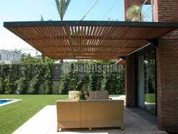 fotografia de pergolas para proteccion solar en una vivienda aislada en pedralbes barcelona por montse bou pergola terrasse pergola dans le jardin pergola