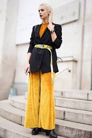 Black And Gold Outfits For Ladies 20 Black And Gold Outfits To Wear This Winter Via Whowhatwearuk Black And Gold Outfit Gold Outfit Street Style Women