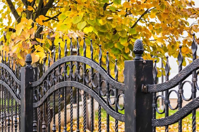 Modern Wrought Iron Gate and Fence by Chilly's Fencing Services