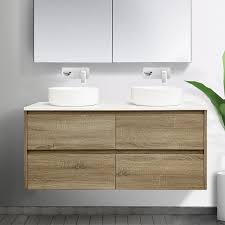 The bathroom is associated with the weekday morning rush, but it doesn't have to be. Kris 1200mm Wall Hung Bathroom Vanity Double Basin Timber Look
