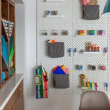 Use the wall space to organize. Craft Room Built In Cabinets Design Ideas