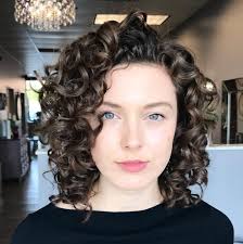 Get that i woke up like this look with tousled layers that are just screaming to be styled with big waves and flipped over to one side. 65 Different Versions Of Curly Bob Hairstyle Curly Hair Styles Naturally Curly Hair Styles Curly Bob Hairstyles