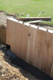 Muret De Soutenement En Traverses De Chene La Triskeline Bordure Jardin Bois Amenagement Jardin Muret De Soutenement