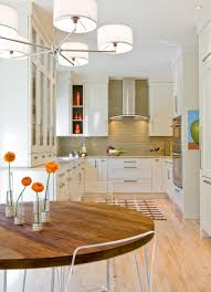 Free shipping* on all modern kitchen chandeliers. Light Fixtures Over Round Tables Ideas Photos Houzz