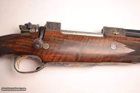 I have been sporterizing and building mausers for 49 years, and these are a real deal. E Dumoulin Herstal 505 Gibbs
