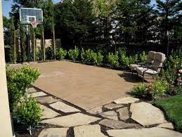 This photo is one example of how the homeowner creates a basketball court and golf area. Indoor Outdoor Basketball Courts Elizabeth Erin Designs