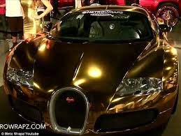 This was insanemy friend brought a gold bugatti, one of the most expensive cars in the world, to my house and he let me drive it. Flo Rida S Gold Bugatti Rapper Spares No Expense As He Gives His 1 7m Car A Very Garish Makeover Daily Mail Online