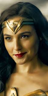 Wonder woman gal gadot's height is 5' 9 inches (1.78 m) and weighs 58 kg (128 lbs). Wonder Woman Smile Wallpaper Movie Wallpaper
